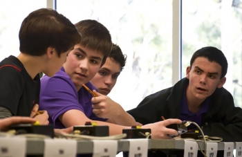Members of Lone Oak Middle Schoolâs winning team at DOEâs 2014 West Kentucky Regional Science Bowl, left to right, David Perriello, Drew Schofield, Ethan Brown, and David Dodd, formulate their answer to a question in the middle school finals Feb. 28 in Paducah, Ky. Members of Lone Oak Middle Schoolâs winning team at DOEâs 2014 West Kentucky Regional Science Bowl, left to right, David Perriello, Drew Schofield, Ethan Brown, and David Dodd, formulate their answer to a question in the middle school finals Feb. 28 in Paducah, Ky.