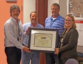 ORP recently recognized Bechtel for its safety program at WTP by recertifying Bechtelâs Voluntary Protection Program Star Status. Pictured from left are WTP Assistant Manager/Federal Project Director Bill Hamel, with ORP; WTP Construction Manager Scott Neubauer, with BNI; WTP Construction Site Manager Danny Hydrick, with BNI; and WTP Project Director Peggy McCullough, with BNI. ORP recently recognized Bechtel for its safety program at WTP by recertifying Bechtelâs Voluntary Protection Program Star Status. Pictured from left are WTP Assistant Manager/Federal Project Director Bill Hamel, with ORP; WTP Construction Manager Scott Neubauer, with BNI; WTP Construction Site Manager Danny Hydrick, with BNI; and WTP Project Director Peggy McCullough, with BNI.