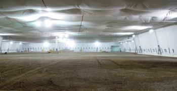 The Accelerated Retrieval Project-VIII building spans a 1.72-acre footprint. More than 2 million pounds of structural steel went into building. The eastern and largest portion of the structure is 250 feet long by 290 feet wide and 70 feet tall. The one-of-a-kind design consists of a center column-supported space frame connecting each side of the facilityâs roof trusses. The Accelerated Retrieval Project-VIII building spans a 1.72-acre footprint. More than 2 million pounds of structural steel went into building. The eastern and largest portion of the structure is 250 feet long by 290 feet wide and 70 feet tall. The one-of-a-kind design consists of a center column-supported space frame connecting each side of the facilityâs roof trusses.