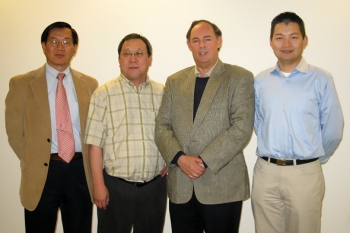 The original team that developed the radiofrequency identification technology to track and monitor radioactive material shipments is pictured here, left to right: Hanchung Tsai, Yung Liu, James Shuler and Kun Chen. Tsai, Liu and Chen are Argonne National Laboratory employees. The original team that developed the radiofrequency identification technology to track and monitor radioactive material shipments is pictured here, left to right: Hanchung Tsai, Yung Liu, James Shuler and Kun Chen. Tsai, Liu and Chen are Argonne National Laboratory employees.
