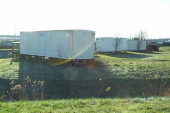 Old trailers that had sat for decades in the southwestern part of the Paducah site were cut up and placed in containers so that the debris could be placed in the siteâs industrial landfill. Old trailers that had sat for decades in the southwestern part of the Paducah site were cut up and placed in containers so that the debris could be placed in the siteâs industrial landfill.