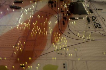 Yellow lights in the team's Paducah site model show groundwater monitoring well and soil boring locations. Yellow lights in the team's Paducah site model show groundwater monitoring well and soil boring locations.