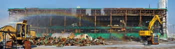 A panoramic view of the east end of the C-410 complex shows a rainbow forming as sunlight passes through vapor from misting machines used to suppress dust. A panoramic view of the east end of the C-410 complex shows a rainbow forming as sunlight passes through vapor from misting machines used to suppress dust.