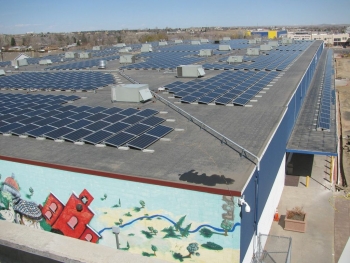 The installation of this 2,244-panel photovoltaic system on Pinnacle Charter School in Denver, Colorado was fully funded by 456 American investors in 10 days. The project is expected to save the school $1.6 million in electricity costs over the next ten years.| Photo courtesy of Mosaic The installation of this 2,244-panel photovoltaic system on Pinnacle Charter School in Denver, Colorado was fully funded by 456 American investors in 10 days. The project is expected to save the school $1.6 million in electricity costs over the next ten years.| Photo courtesy of Mosaic