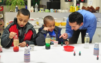 Michael Rigas, a civil engineer with OREM, teaches students at Woodland Elementary how to make lava lamps. Michael Rigas, a civil engineer with OREM, teaches students at Woodland Elementary how to make lava lamps.