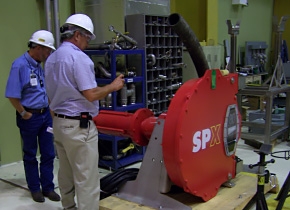 Representatives from the Oak Ridge Office of Environmental Management observe a mock-up reactor basin at the Hanford site where the Richland and CH2M HILL are testing equipment to be used to retrieve highly radioactive sludge. Representatives from the Oak Ridge Office of Environmental Management observe a mock-up reactor basin at the Hanford site where the Richland and CH2M HILL are testing equipment to be used to retrieve highly radioactive sludge.