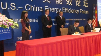 Assistant Secretary Dr. Dave Danielson and Vice Chairman Xie Zhenhua (right) of Chinaâs National Development and Reform Commission witness the MOU signing between the U.S.-China Energy Cooperation Program and the Chinese Society for Urban Studies. Assistant Secretary Dr. Dave Danielson and Vice Chairman Xie Zhenhua (right) of Chinaâs National Development and Reform Commission witness the MOU signing between the U.S.-China Energy Cooperation Program and the Chinese Society for Urban Studies.