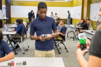 A student from from Chicago's Laura S. Ward STEM School learns to use computational thinking during <a href="http://www.anl.gov/articles/inspiring-next-generation-computational-thinkers">My Brother's Keeper's visit to Argonne National Lab.</a> | Photo Courtesy of Argonne National Lab. A student from from Chicago's Laura S. Ward STEM School learns to use computational thinking during <a href="http://www.anl.gov/articles/inspiring-next-generation-computational-thinkers">My Brother's Keeper's visit to Argonne National Lab.</a> | Photo Courtesy of Argonne National Lab.