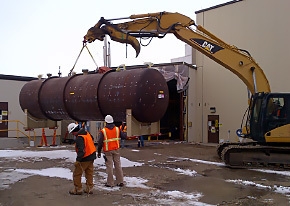 A tank at the Materials and Fuels Complex containing residual sodium is moved prior to waste treatment. A tank at the Materials and Fuels Complex containing residual sodium is moved prior to waste treatment.