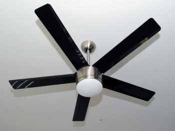 Ceiling fans circulate air in a room to help keep occupants cool. | Photo courtesy of Thomas Kelsey/U.S. Department of Energy Solar Decathlon
Ceiling fans circulate air in a room to help keep occupants cool. | Photo courtesy of Thomas Kelsey/U.S. Department of Energy Solar Decathlon