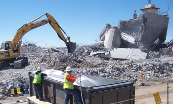 Packaging of low-level radioactive waste generated by the demolition of the Reactor Maintenance, Assembly, and Disassembly (R-MAD) facility. R-MAD was part of the Nuclear Rocket Development Station that operated at the NNSS between 1958 and 1971. As is required with other Industrial Sites, Soils and Underground Test Area locations, R-MAD investigation and corrective action plans were approved by the state of Nevada under the Federal Facility Agreement and Consent Order. Packaging of low-level radioactive waste generated by the demolition of the Reactor Maintenance, Assembly, and Disassembly (R-MAD) facility. R-MAD was part of the Nuclear Rocket Development Station that operated at the NNSS between 1958 and 1971. As is required with other Industrial Sites, Soils and Underground Test Area locations, R-MAD investigation and corrective action plans were approved by the state of Nevada under the Federal Facility Agreement and Consent Order.