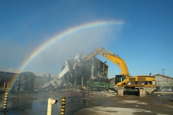 A rainbow appears over the Paducah Site's East End Smelter, a 21,000-square-foot complex used until the 1980s to smelt metal. Recovery Act workers used heavy equipment to demolish the smelter in September 2010, a year ahead of schedule and $10 million under budget. A rainbow appears over the Paducah Site's East End Smelter, a 21,000-square-foot complex used until the 1980s to smelt metal. Recovery Act workers used heavy equipment to demolish the smelter in September 2010, a year ahead of schedule and $10 million under budget.