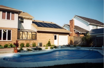 Covering a pool when it is not in use is the single most effective means of reducing pool heating costs. | Photo courtesy of Aquatherm Industries. Covering a pool when it is not in use is the single most effective means of reducing pool heating costs. | Photo courtesy of Aquatherm Industries.
