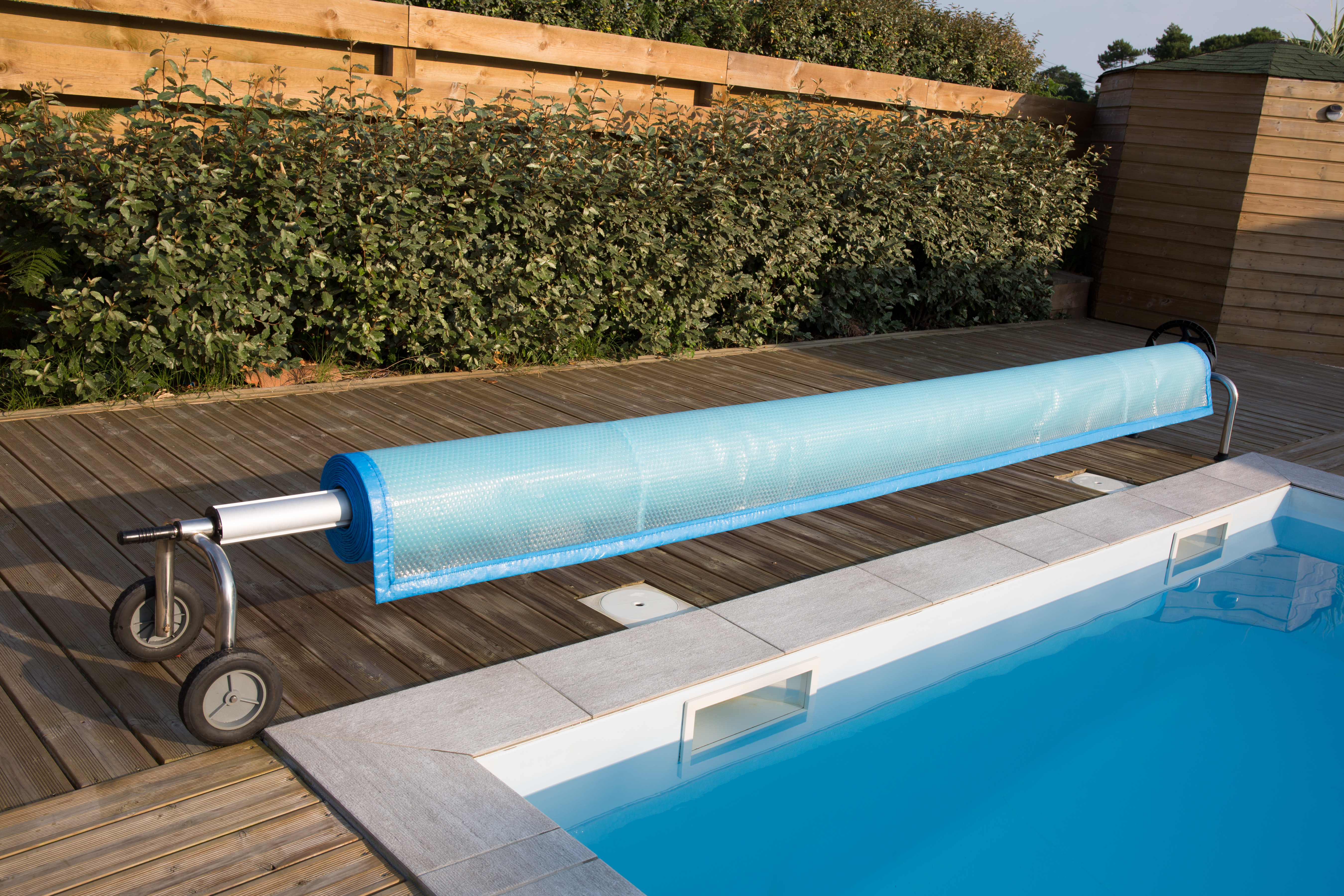 Pool cover that heats pool best sale