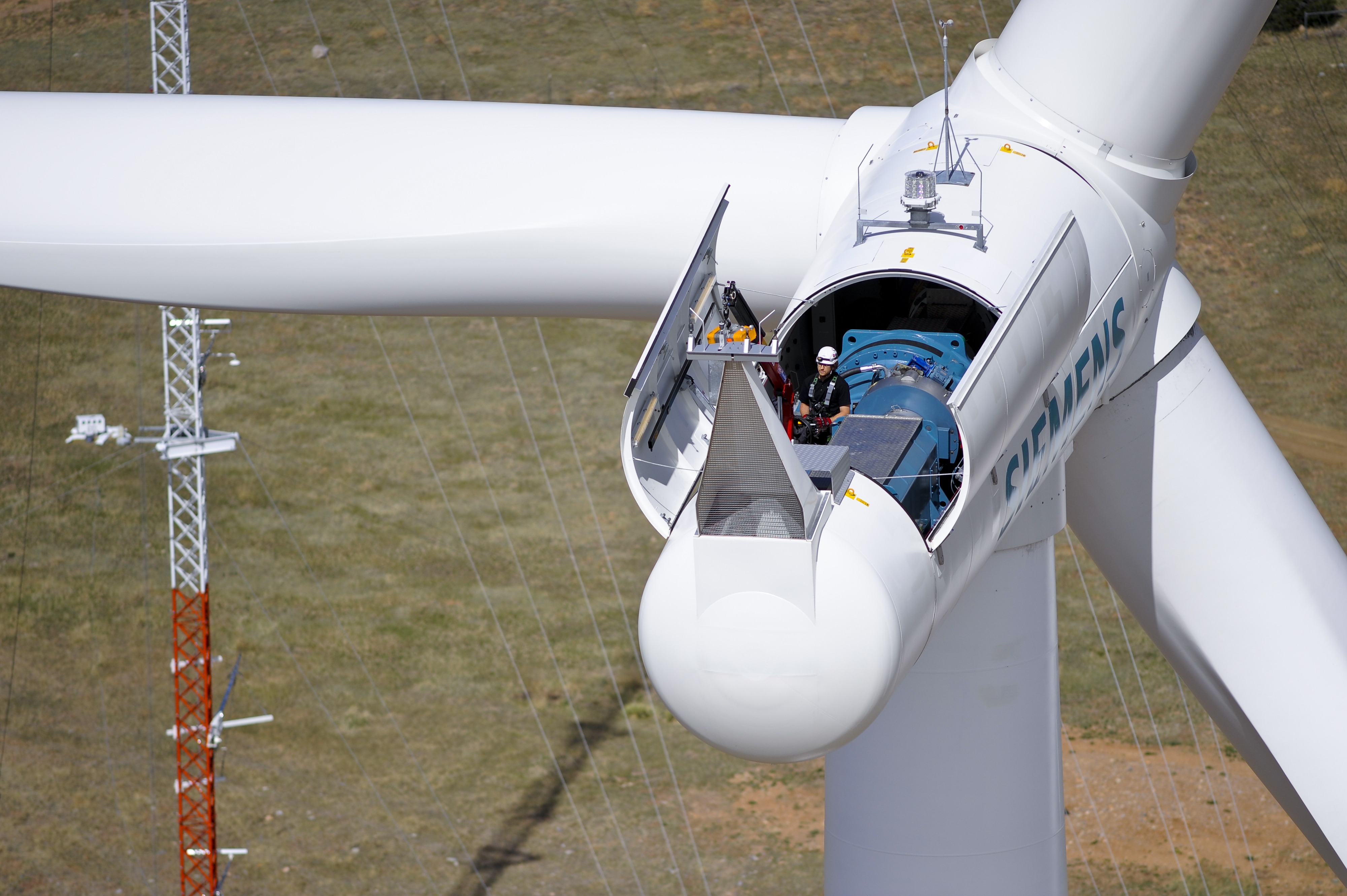 An aerial view of a wind turbine under construction