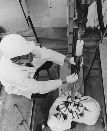 A fuel element for the Experimental Beryllium Oxide Reactor is assembled at General Atomic Division of General Dynamics in San Diego. c. 1964