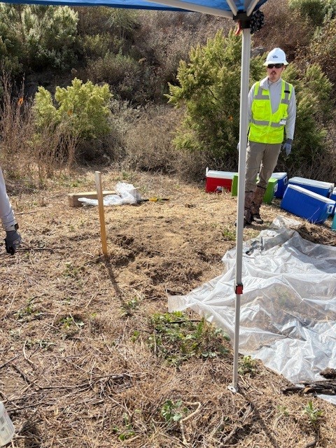 Worker samples soil at SSFL