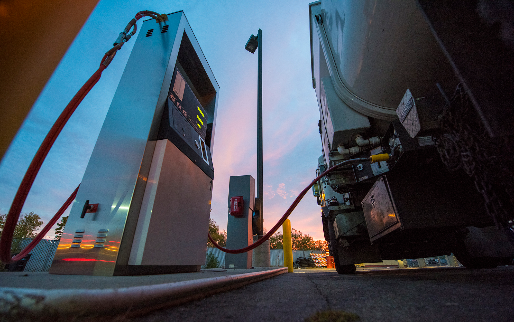 Workers at the City and County of Denver Platte Facility fuel their garbage trucks with CNG.