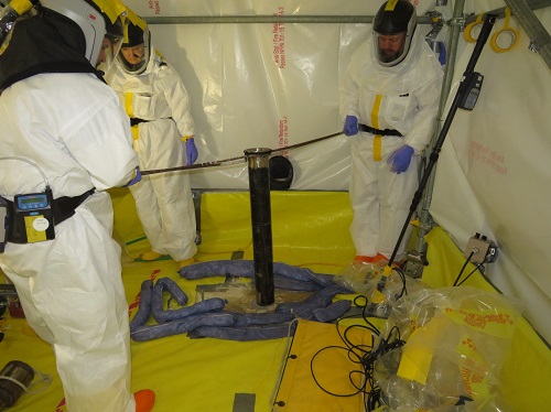 Crews perform sampling and characterization of the hot cells in the former Fission Production Development Lab.