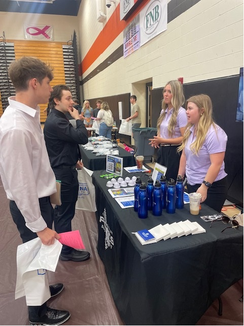 Students and employees at a career fair
