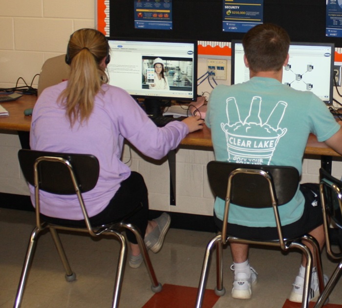 Two students working at computers