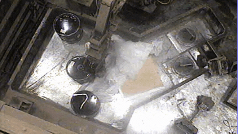 Rotating set of images of waste at the Idaho Site