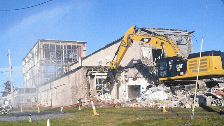 Rotating set of images of demolition 