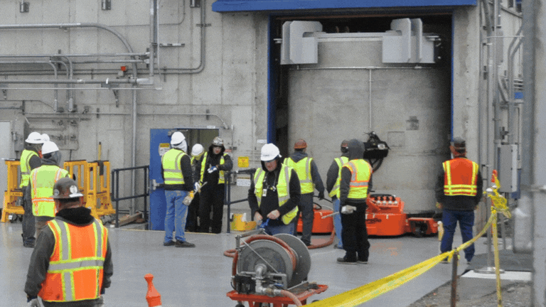 Rotating set of images of a transfer of a large capsule at the Hanford Site