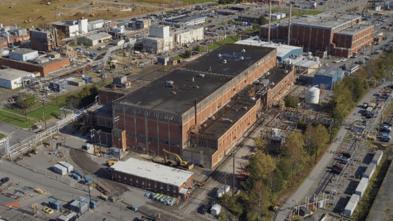 Rotating images of before and after a building demolition at the Oak Ridge Site