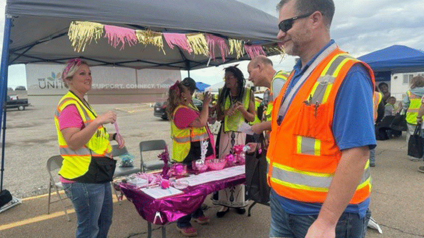 Rotating set of images of employees participating in a safety event outdoors at the Idaho Site