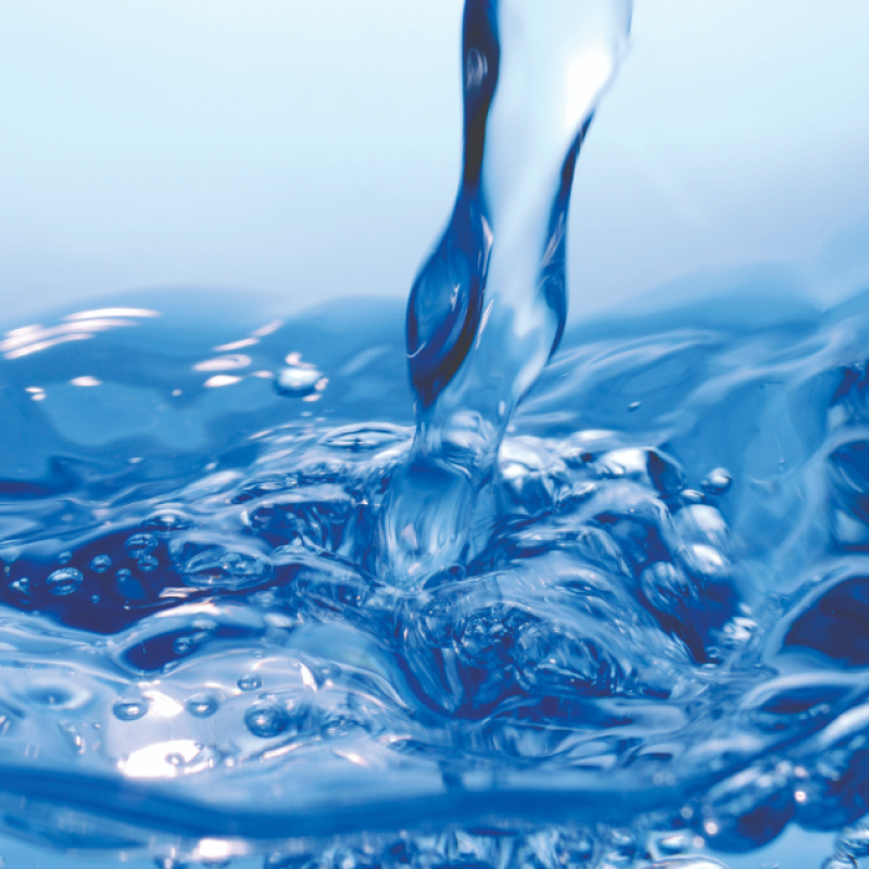 Stream of water falling into water.