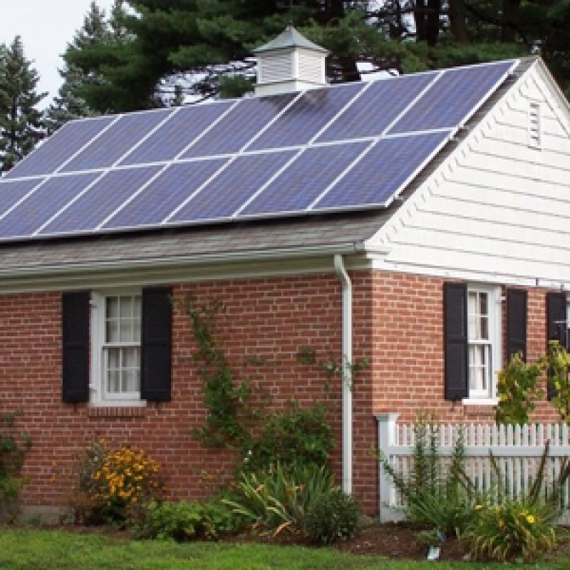 House with rooftop solar panels