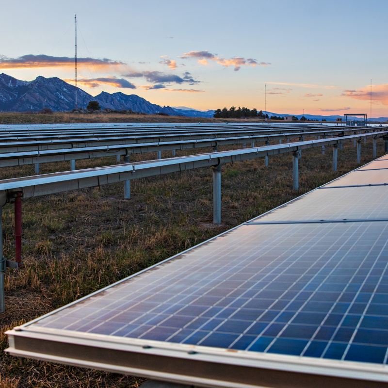 The sun sets upon the Flatirons Campus (FC) of the National Renewable Energy Laboratory (NREL), and the 1MW photovoltaics array.