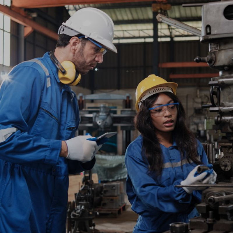 Two Industrial workers in protective gear