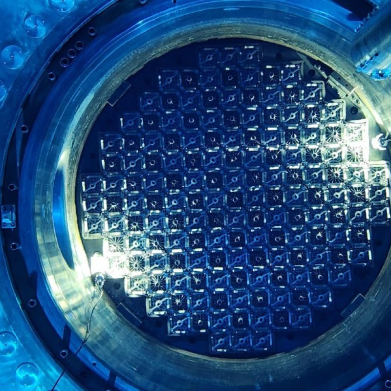 Photo inside Vogtle Unit 3 reactor at criticality, emitting a blue glow.