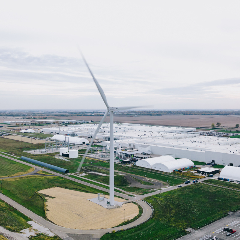 Wind turbine at a power plant