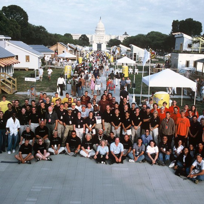 Project Manager Cecile Warner pause for a photo with representatives from the teams 