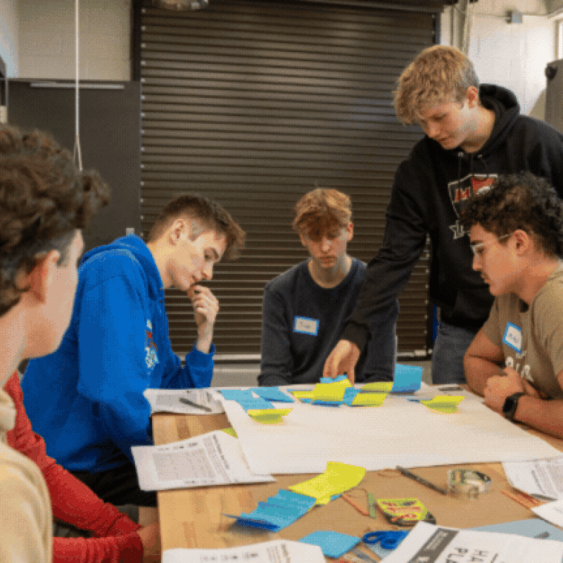 Rotating set of images of students participating in STEM activities