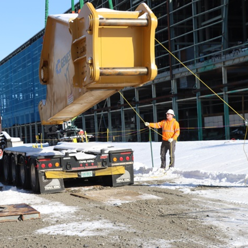 A large delivery being made at the Portsmouth Site inside a large yellow container