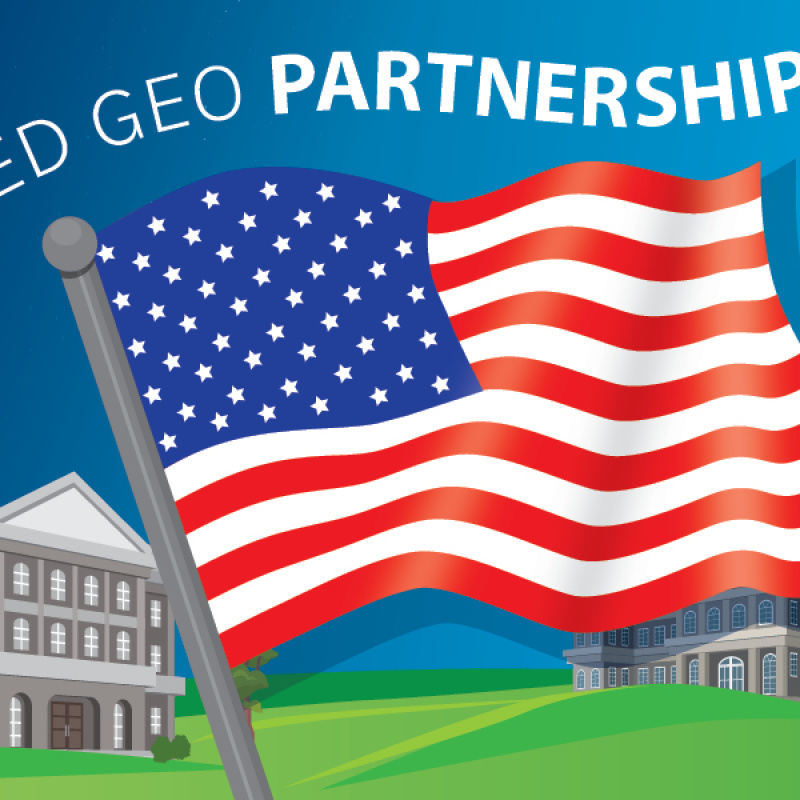 FedGeo Partnerships. Below the text is a waving American flag and two municipal or government buildings on green hills against blue skies.
