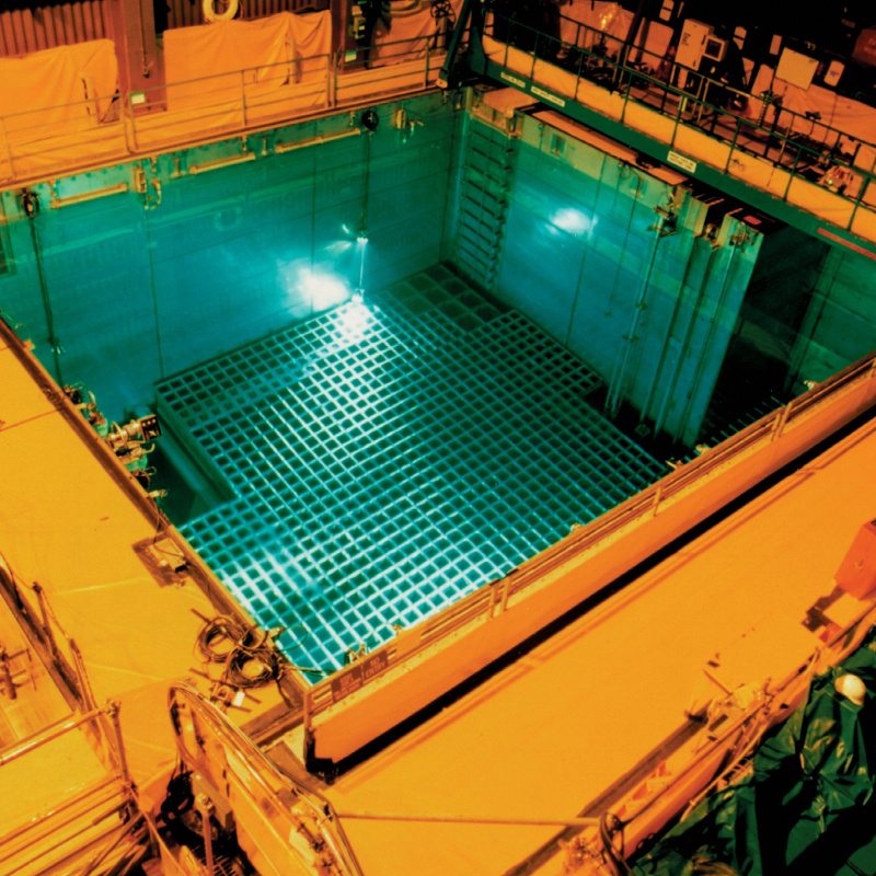 Spent Fuel Pool at the San Onofre Nuclear Generating Station, a blue pool surrounded by yellow walkways.