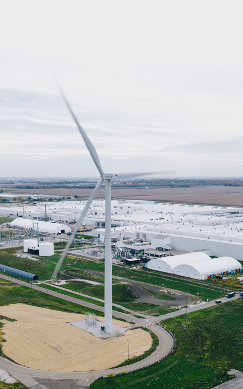 Wind turbine at a power plant