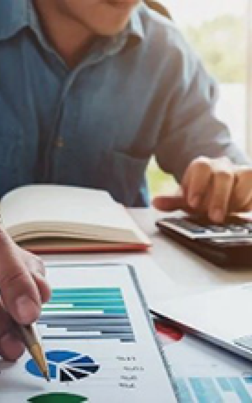 Man making calculations on paper