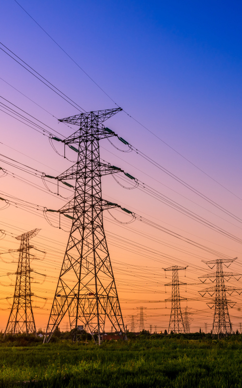 High voltage electricity tower sky sunset landscape,industrial background.