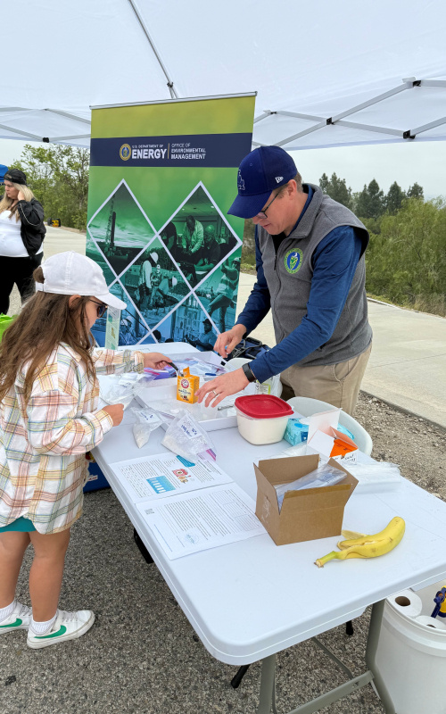 Josh Mengers demonstrates a science activity
