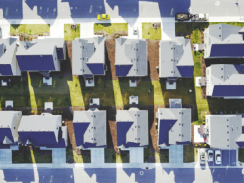 Overhead photo of rows of houses in a neighborhood.