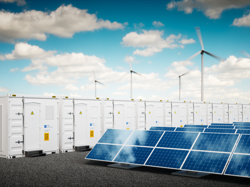 a future grid with solar panels, wind turbines and battery storage. 