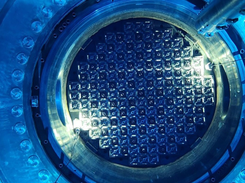 Photo inside Vogtle Unit 3 reactor at criticality, emitting a blue glow.