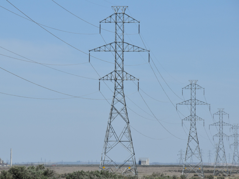 A group of tall power lines