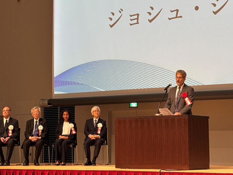 Dr. Josh Silverman delivers a message supporting the Radiation Effects Research Foundation at the Commemorative Ceremony of its 50th Anniversary in Nagasaki. Photo Credit: Cato M Milder 2025